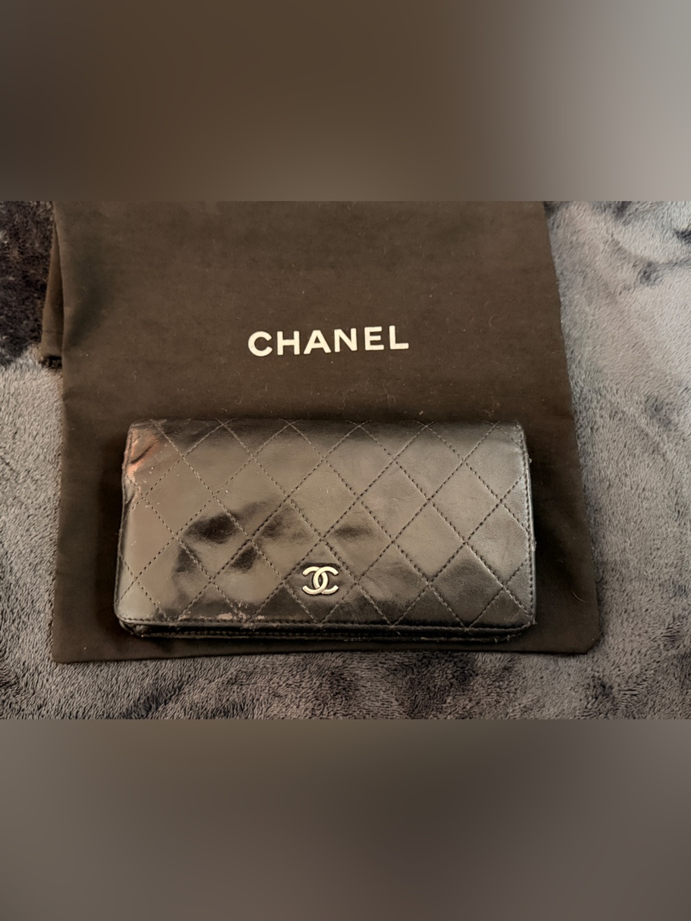 CHANEL Black Quilted Lambskin Wallet with Silver CC Emblem